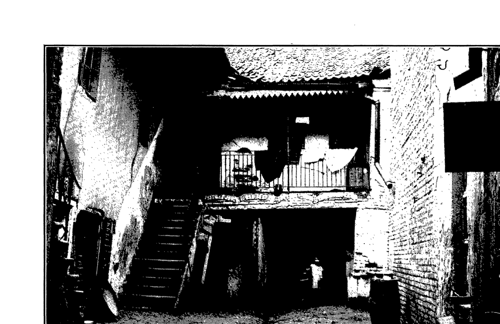 Shabes Zhirmunski's court from inside, with the rear staircase and the poor porch, photographed in 1926